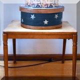F87. Square table with turned legs.